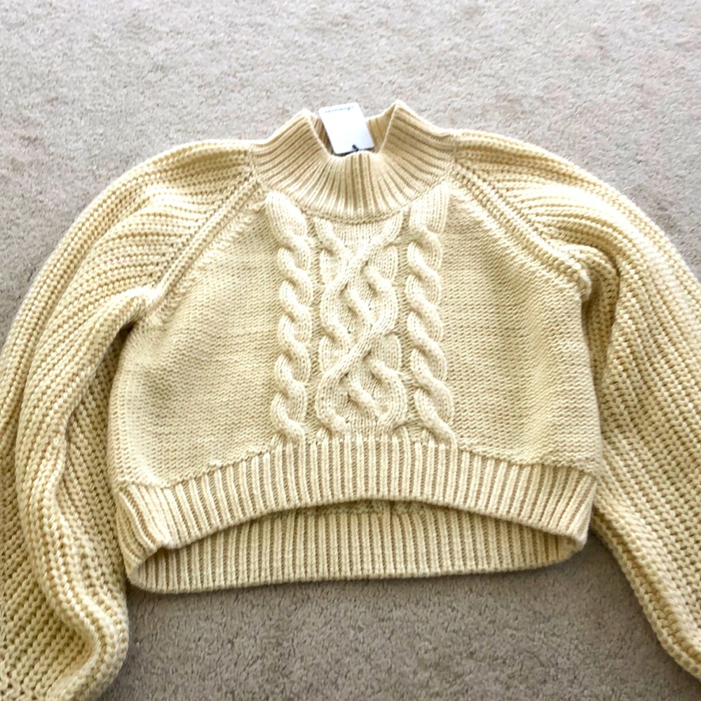 Cropped cream cable sweater